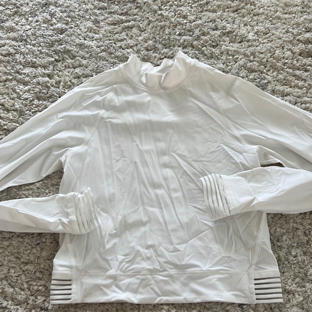 white lululemon swim shirt, gently used in great condition